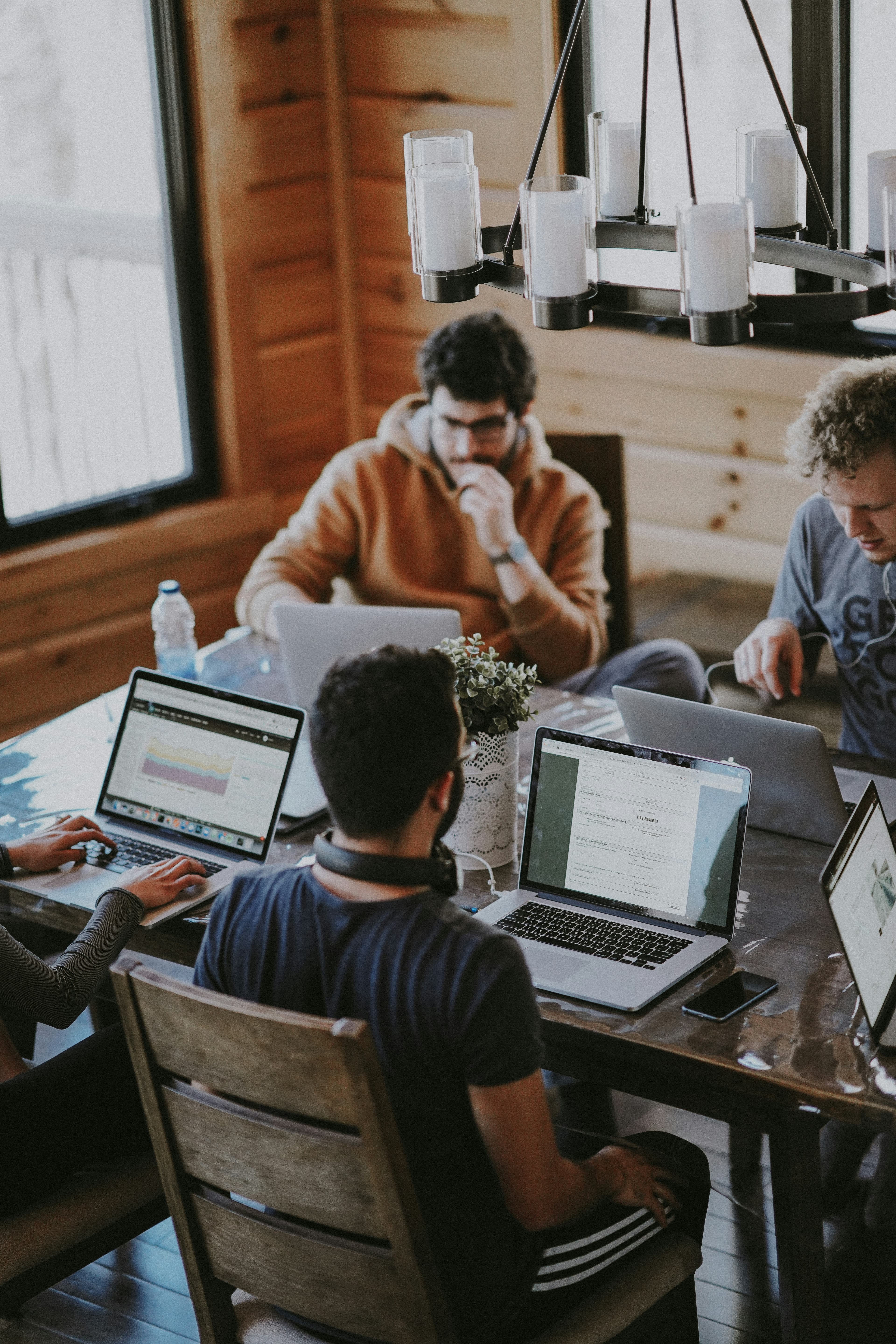 A diverse professional team collaborating around a table