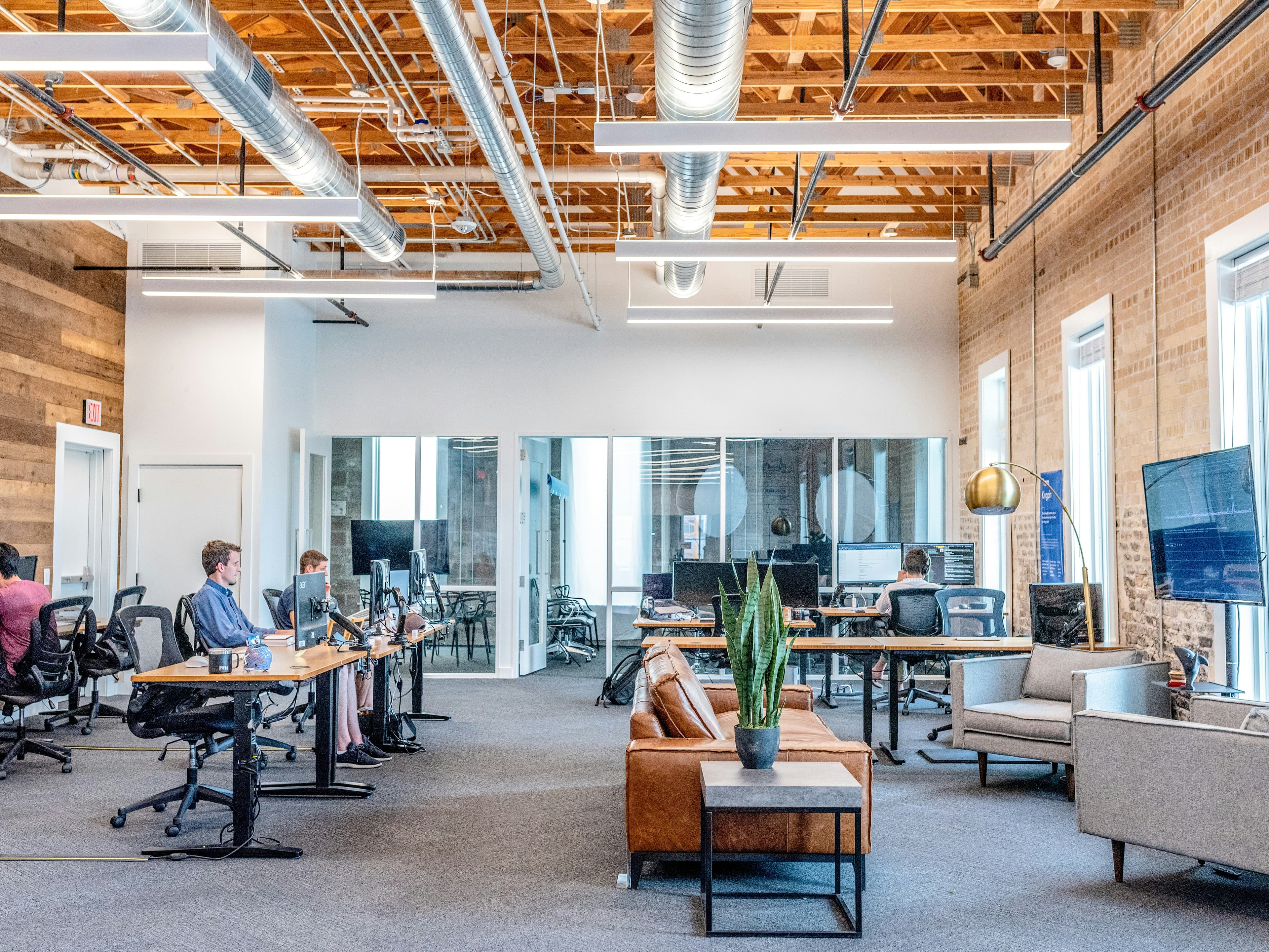 Professionals discussing a business partnership across a conference table