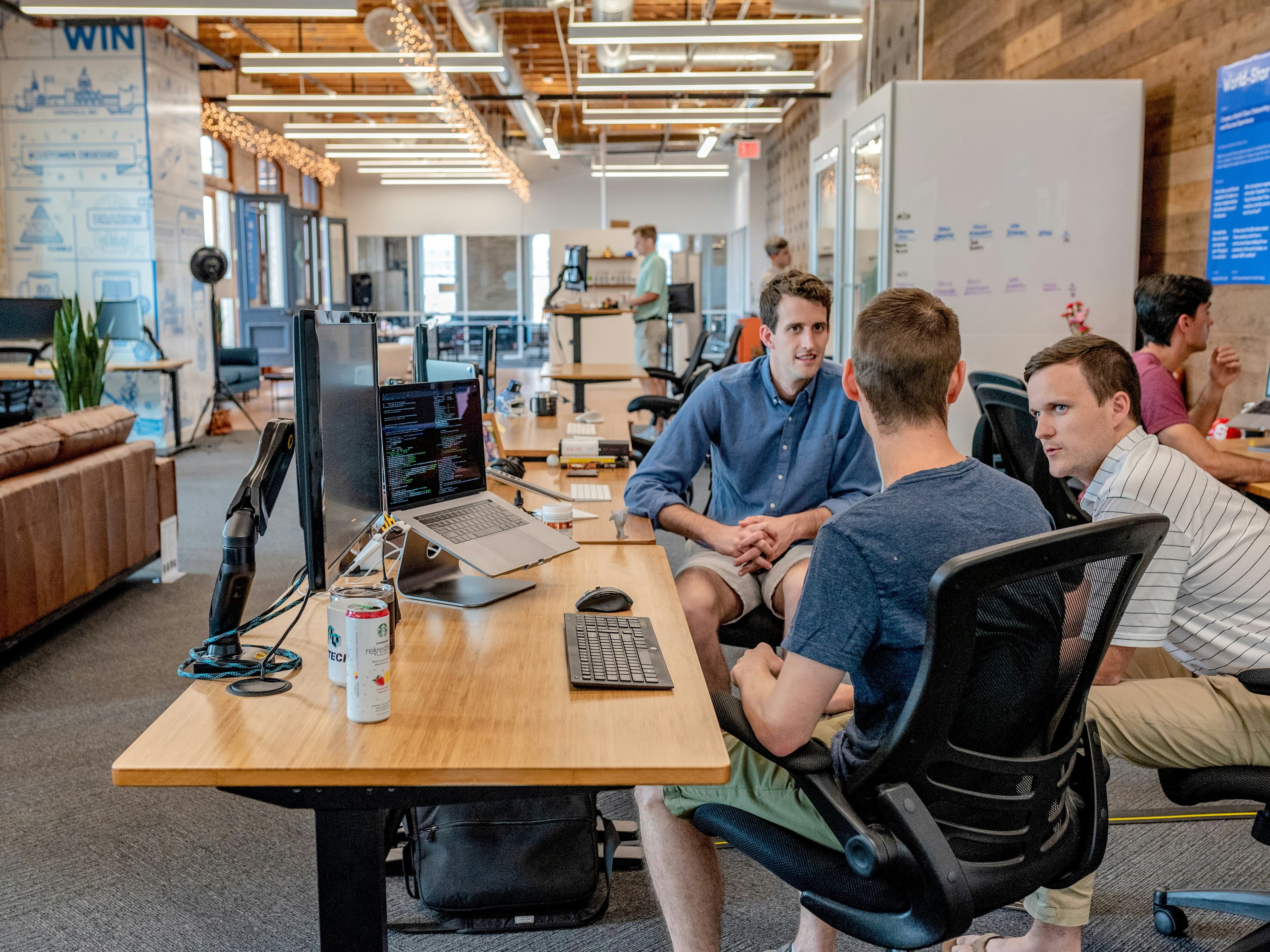 A team reviewing operational performance metrics together in a meeting